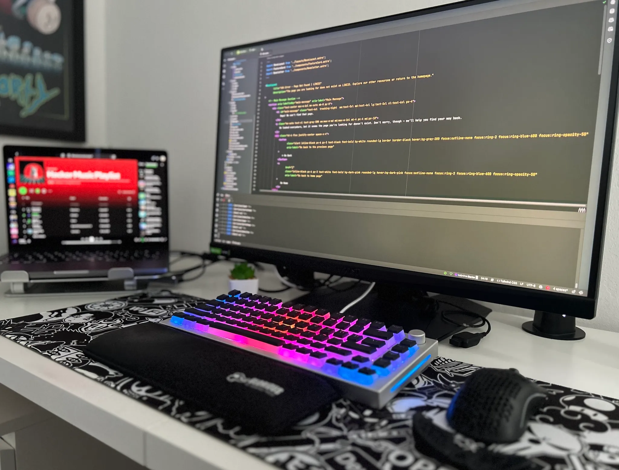 Developer workspace with multiple monitors showing code